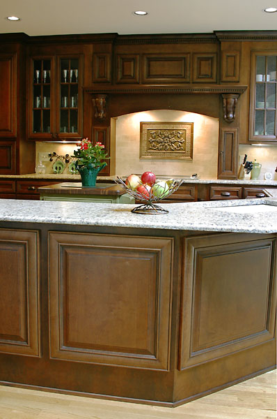 kitchen counter with island and stove in separate spaces creates many working areas