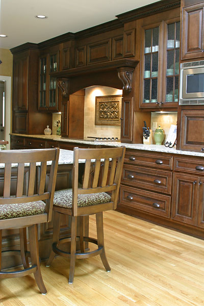 stove surround in warm wood cabinetry