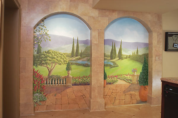 A double panel mural surrounded by tiled archways in the bar have you looking out at a peaceful country in the hills scene