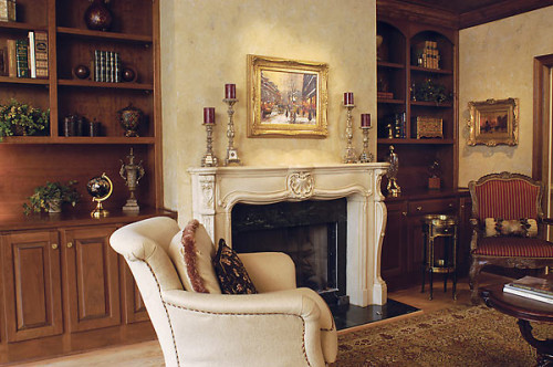 Cozy den with Fine Art, Faux Stone Fireplace, Detailed Upholstery and Pillows