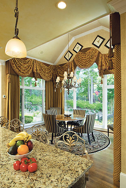 window treatments frame round and square top windows in a breakfast room