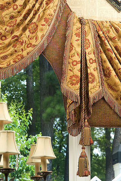 tassle and trim detail on a window treatment