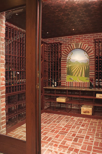 Brick wine cellar with commissioned mural